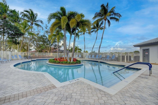 view of swimming pool featuring a patio area