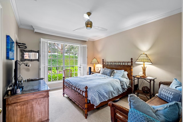 bedroom featuring light colored carpet, ceiling fan, and ornamental molding