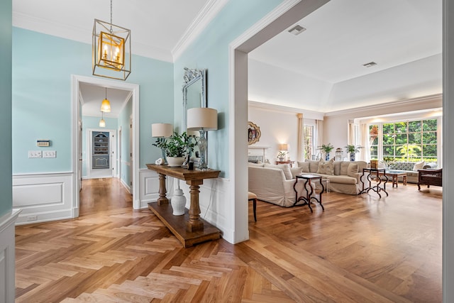 hallway featuring light parquet flooring and crown molding