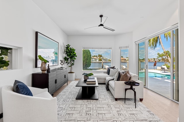 1026 Seasage Dr, Delray Beach, FL 33483 - living room with ceiling fan and a water view