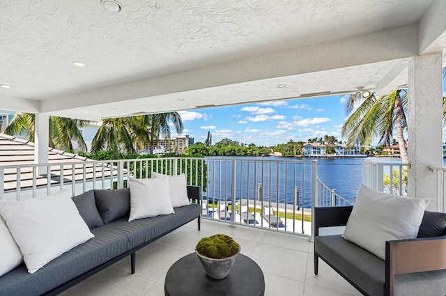 1026 Seasage Dr, Delray Beach, FL 33483 - view of patio / terrace featuring a water view, outdoor lounge area, and a balcony