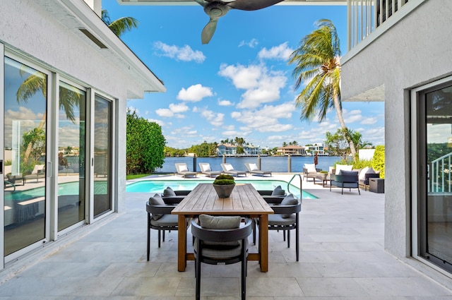 1026 Seasage Dr, Delray Beach, FL 33483 - view of patio with a water view, an outdoor pool, and outdoor lounge area