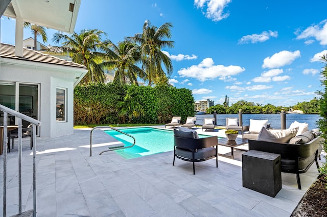 view of pool with a patio and an outdoor hangout area