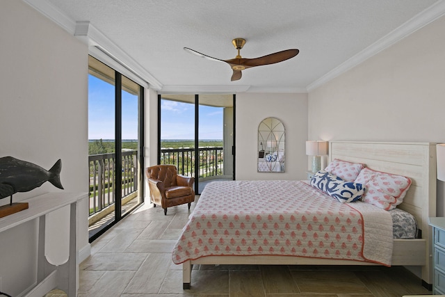 bedroom with ceiling fan, crown molding, access to exterior, and floor to ceiling windows