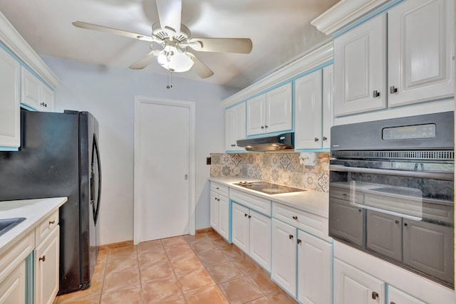 kitchen featuring black appliances, ceiling fan, white cabinets, and tasteful backsplash