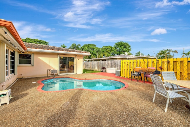 view of pool with a patio area