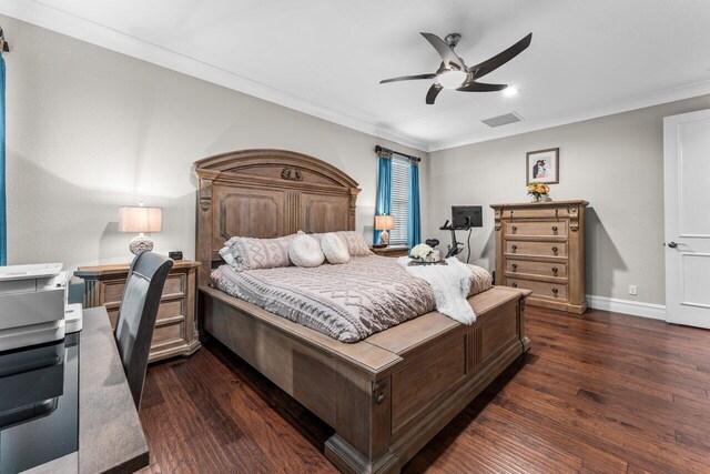 bedroom with ceiling fan, wood finished floors, visible vents, baseboards, and ornamental molding