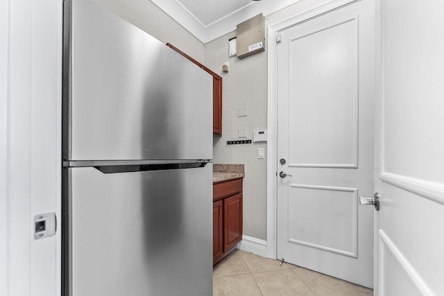 bathroom with tile patterned flooring and vanity