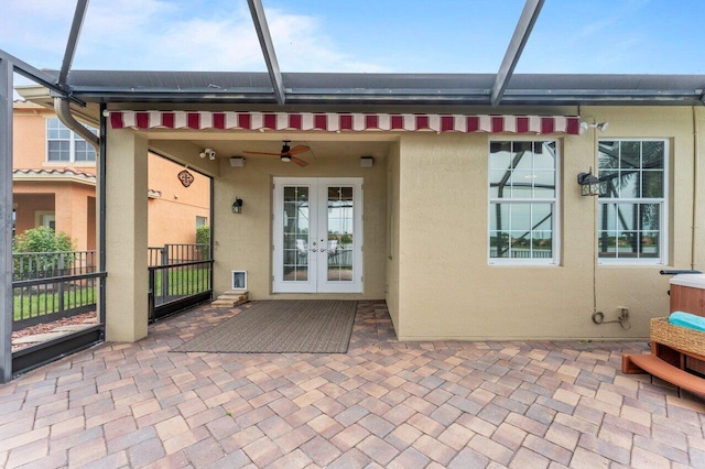 exterior space with french doors, a patio, and stucco siding