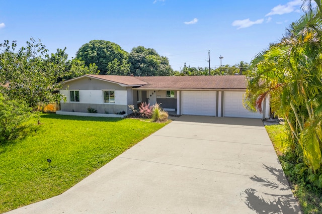 ranch-style house with a front yard and a garage