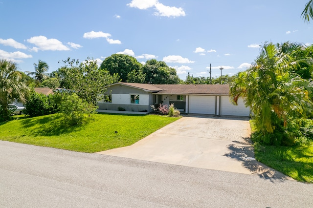 single story home with a front yard and a garage