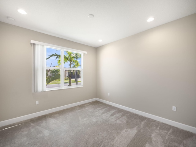 view of carpeted spare room