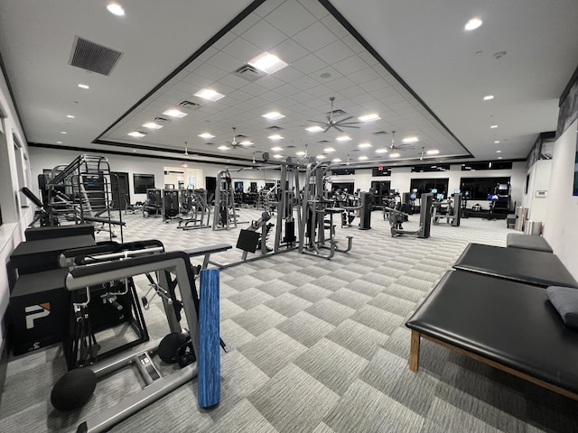 exercise room featuring carpet floors and ceiling fan