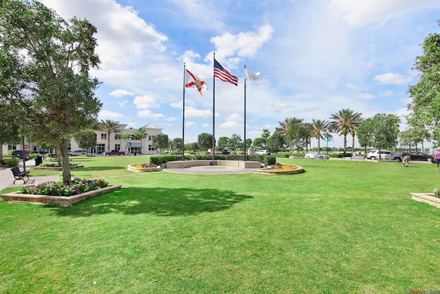 view of home's community featuring a lawn