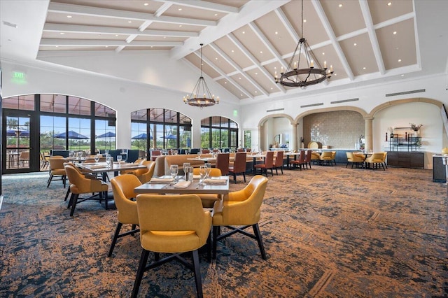 carpeted dining space with a notable chandelier, high vaulted ceiling, and beam ceiling