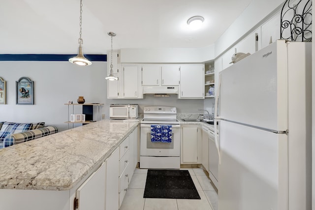 kitchen with hanging light fixtures, white cabinetry, light tile patterned flooring, sink, and white appliances