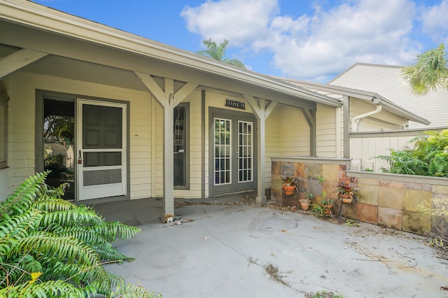 doorway to property featuring a patio