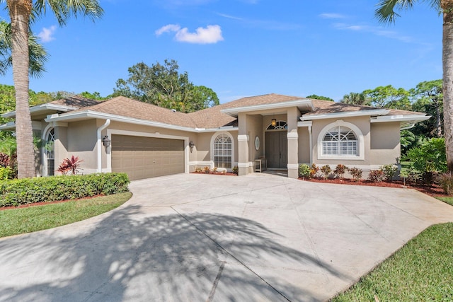 view of front of property with a garage