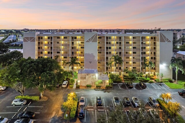 view of outdoor building at dusk