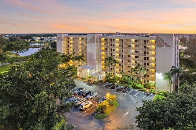 outdoor building at dusk with a water view