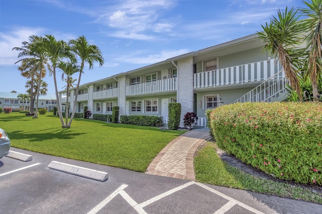 5540 N Ocean Blvd Unit 204, Ocean Ridge, FL 33435 - view of property with uncovered parking
