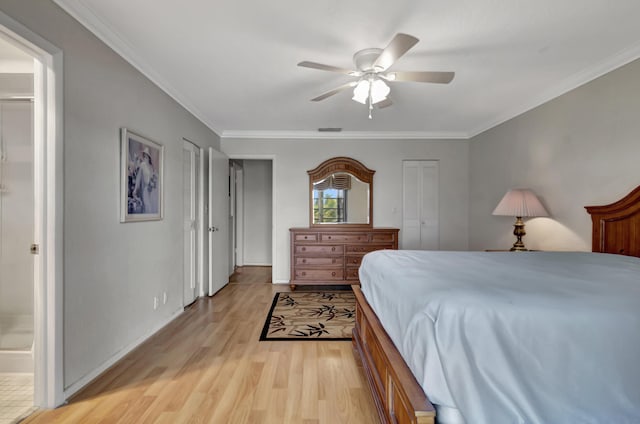 5540 N Ocean Blvd Unit 204, Ocean Ridge, FL 33435 - bedroom with light wood-style flooring, crown molding, ensuite bathroom, a ceiling fan, and baseboards
