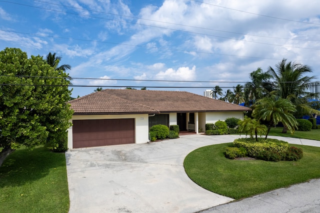 ranch-style house with a front lawn and a garage