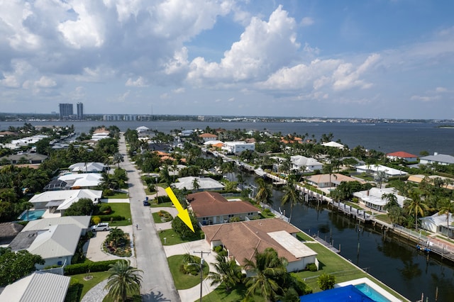 drone / aerial view with a water view