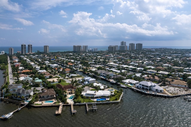 bird's eye view with a water view