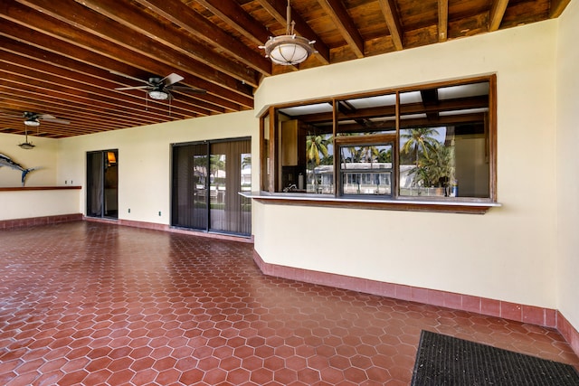 view of patio featuring ceiling fan