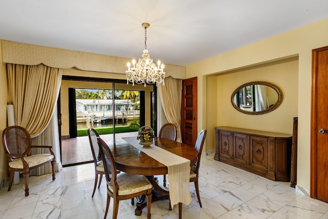 dining area with a notable chandelier