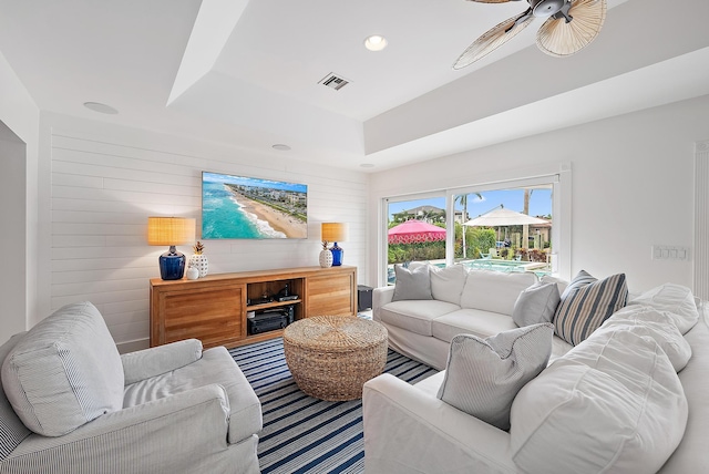 living room with ceiling fan