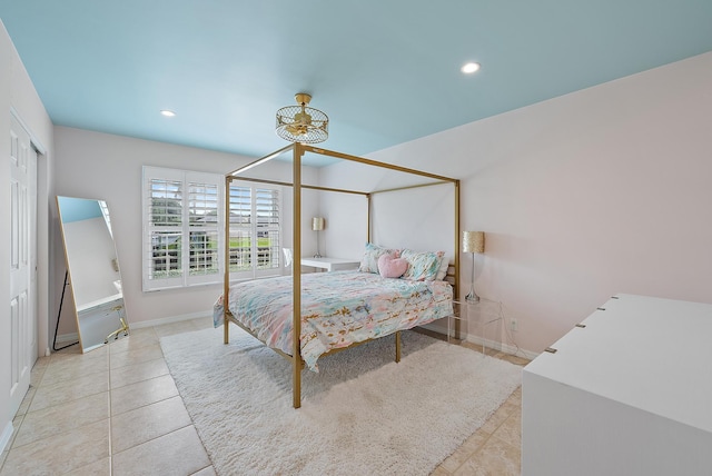 bedroom featuring light tile patterned floors