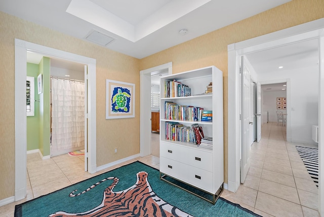 living area with light tile patterned floors