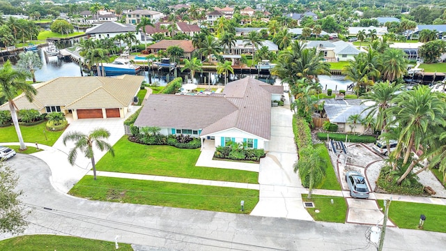 birds eye view of property featuring a water view