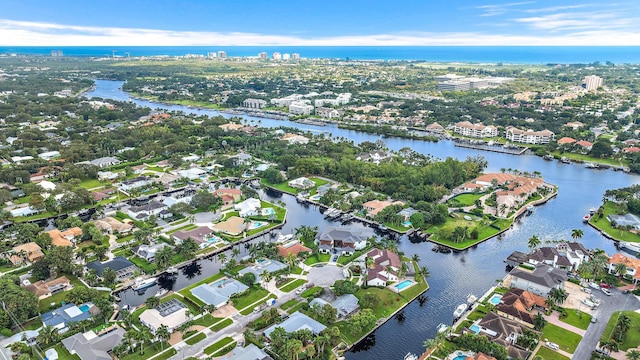 drone / aerial view featuring a water view