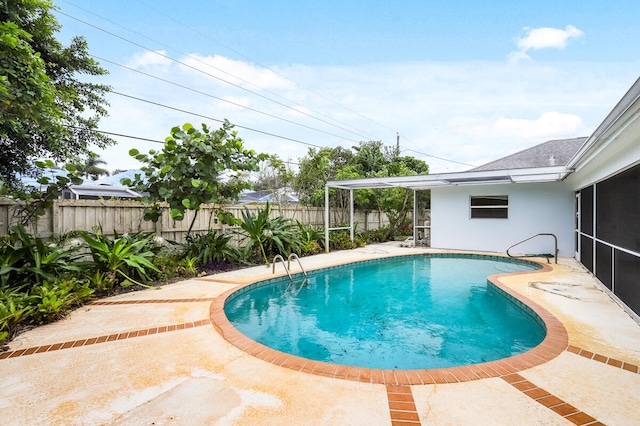 view of pool featuring a patio