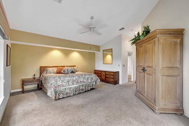 carpeted bedroom featuring vaulted ceiling and ceiling fan