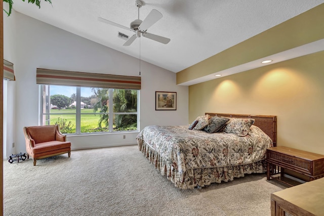 carpeted bedroom featuring a textured ceiling, high vaulted ceiling, and ceiling fan