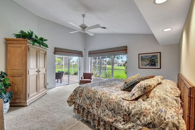 carpeted bedroom featuring lofted ceiling, a textured ceiling, access to exterior, and ceiling fan