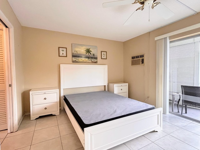 tiled bedroom with access to outside, ceiling fan, and a wall mounted AC