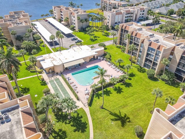 birds eye view of property featuring a water view