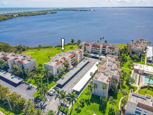 bird's eye view with a water view