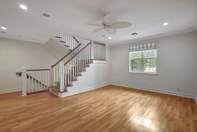 unfurnished living room with ceiling fan, light hardwood / wood-style flooring, and ornamental molding