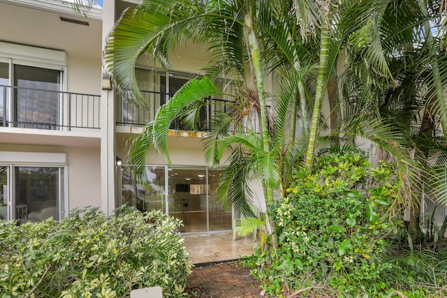 entrance to property with a patio area