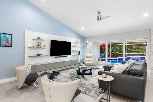 living room featuring ceiling fan, high vaulted ceiling, and light hardwood / wood-style flooring