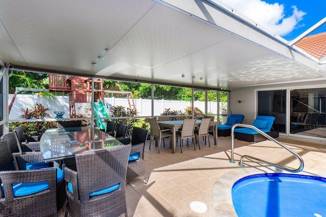 view of patio / terrace with a fenced in pool