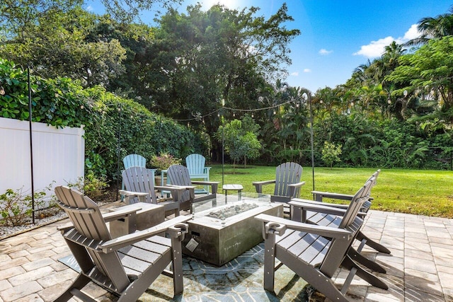 view of patio featuring an outdoor fire pit