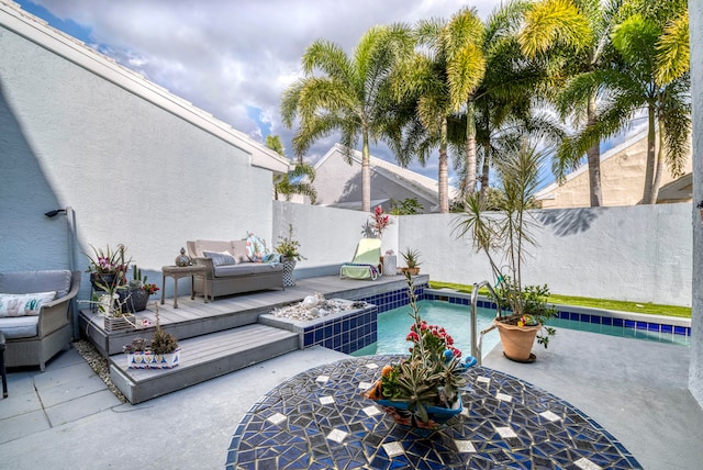 view of swimming pool with a patio area