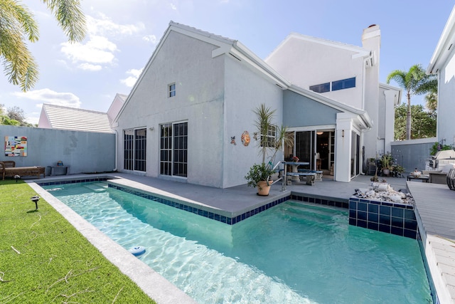 view of swimming pool with a patio